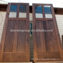 les portes de dalle de panneau en bois de noix avec le verre trempé supérieur conçu peuvent être utilisées comme porte de grange ou porte intérieure